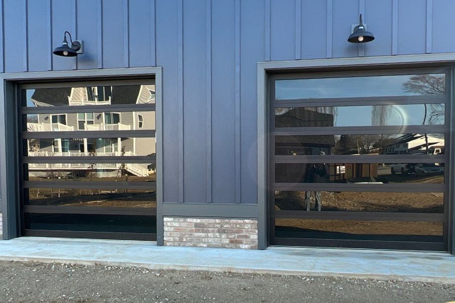 At Armin’s Garage Doors, we offer aluminum full-view doors that perfectly balance aesthetics and functionality for both residential and commercial buildings.