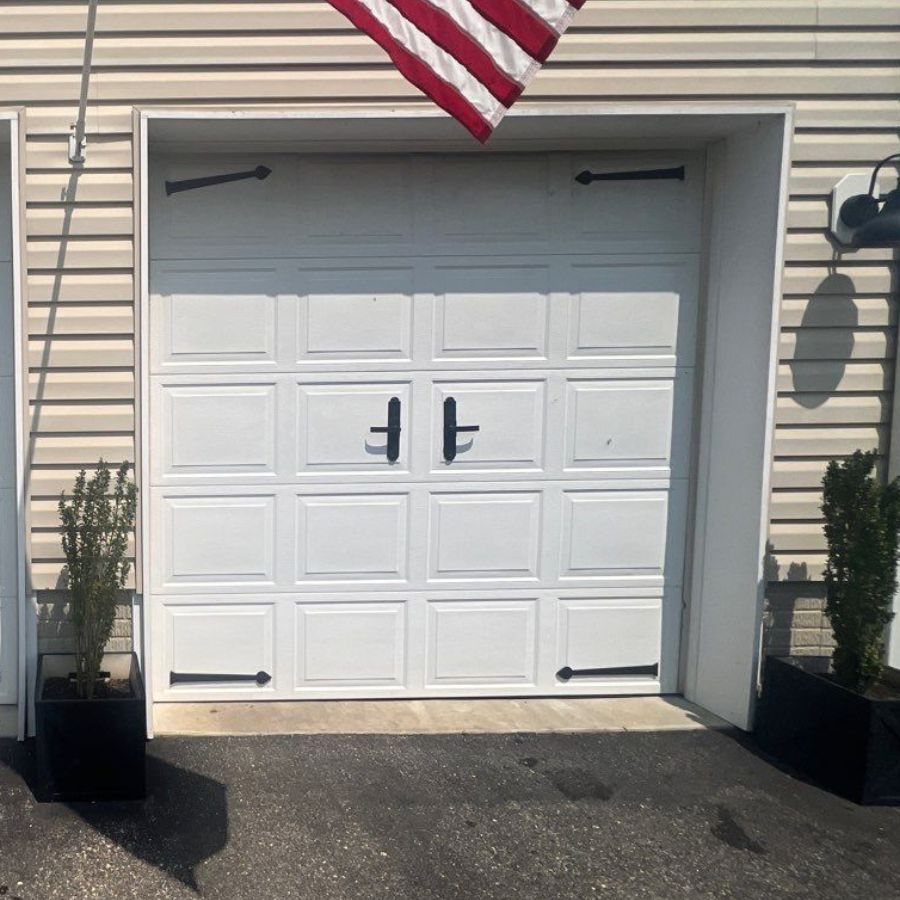 While we’re discussing our robust and durable garage doors, it’s crucial to address their wind load ratings and compliance standards.